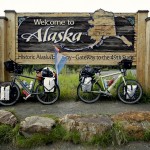 Our Santos Travelmaster Rohloff bikes at the Alaska - Canada border sign